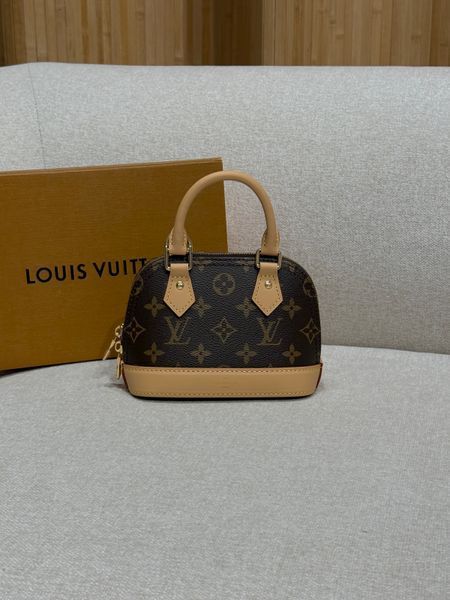 Сумка Louis Vuitton Nano Alma Bag in Monogram Coated Canvas 494 фото