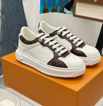 Жіночі кеди Louis Vuitton Time Out White Calfskin Embossed Monogram Sneakers 38 0011 фото