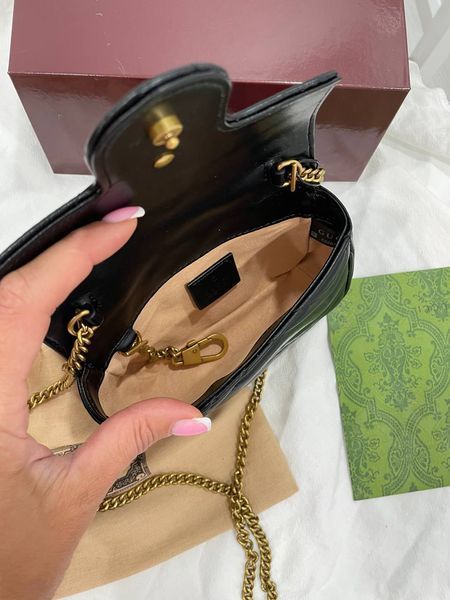 Сумка Gucci Marmont Super Mini Shoulder Bag in Black Matelass&eacute; Chevron Leather/Gold-Toned Hardware 0611251 фото