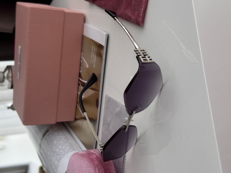 Окуляри Miu Miu Sunglasses MU 140AV AAV-101 Black/Silver 0319 фото