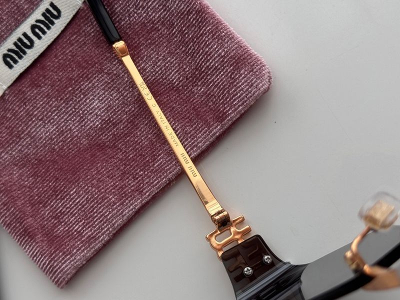 Окуляри Miu Miu Sunglasses MU 140AV 5AK-101 Black/Gold 0319 фото