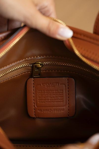 Сумка Coach Swing Zip Bag 26 in Glovetanned Leather 1941 Saddle/Brass Hardware 0543 фото