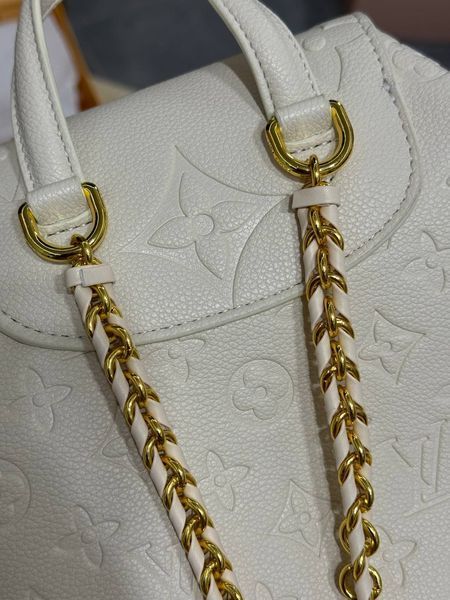 Рюкзак Louis Vuitton Backup Monogram Empreinte Leather Milk 7351 фото