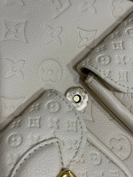 Рюкзак Louis Vuitton Backup Monogram Empreinte Leather Milk 7351 фото