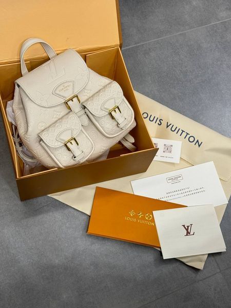 Рюкзак Louis Vuitton Backup Monogram Empreinte Leather Milk 7351 фото