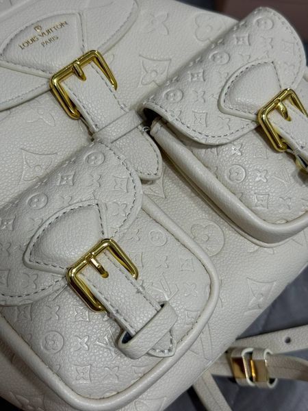 Рюкзак Louis Vuitton Backup Monogram Empreinte Leather Milk 7351 фото
